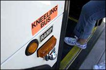 image of person stepping onto a bus